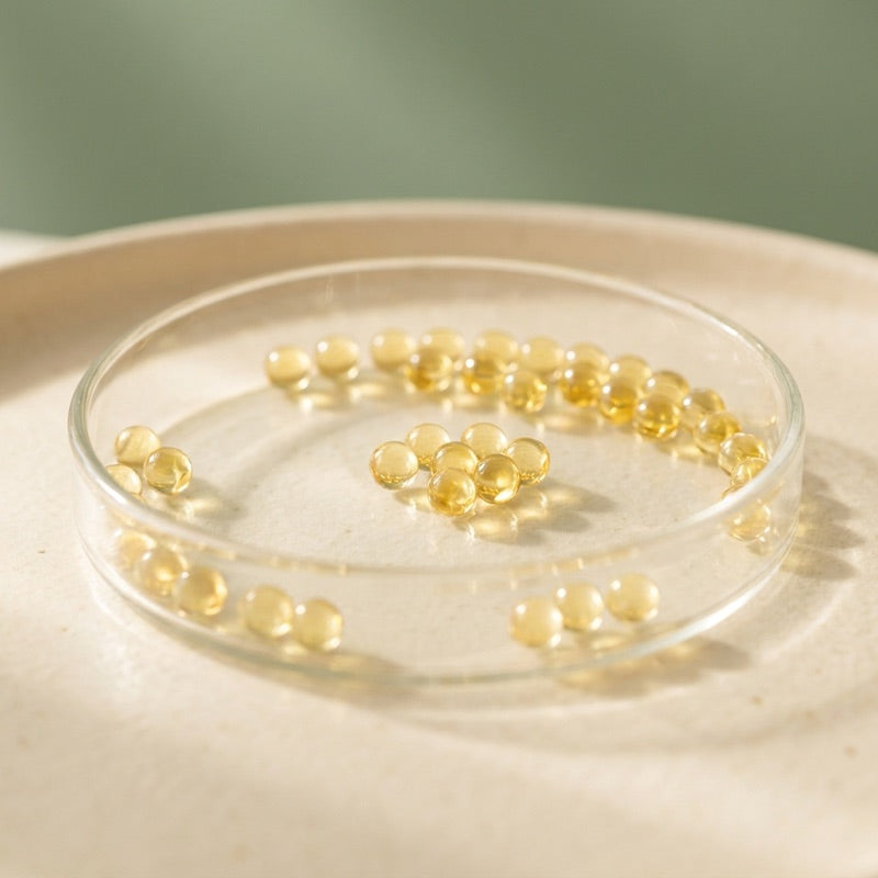 Vitamin D3 ingredient in a glass dish